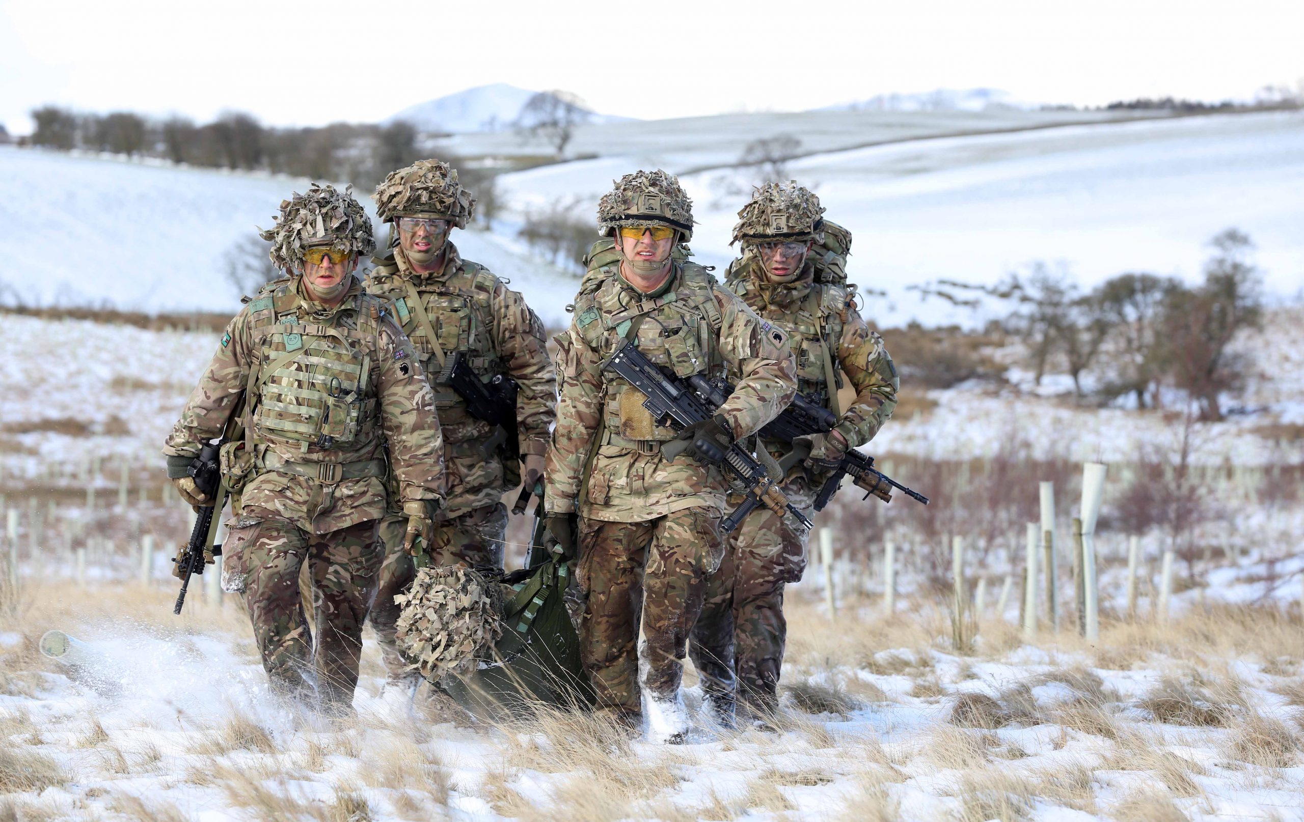 Jordan Morrison and Timothy Lambert leading a stretcher bearing party at Warcop Training Area