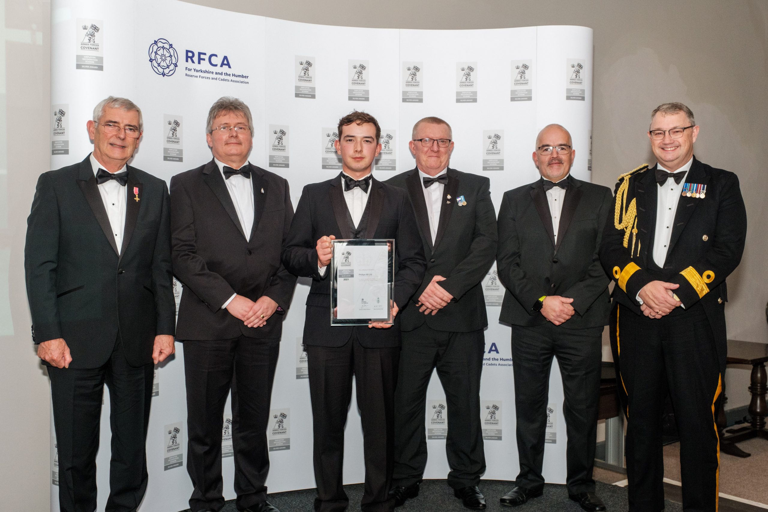 HM Lord-Lieutenant of the East Riding of Yorkshire Jim Dick with award winners from Phillips 66 - Dick Rudd, Dominic Parry, Sean Comrie and Ken Weller with Commodore Phil Waterhouse
