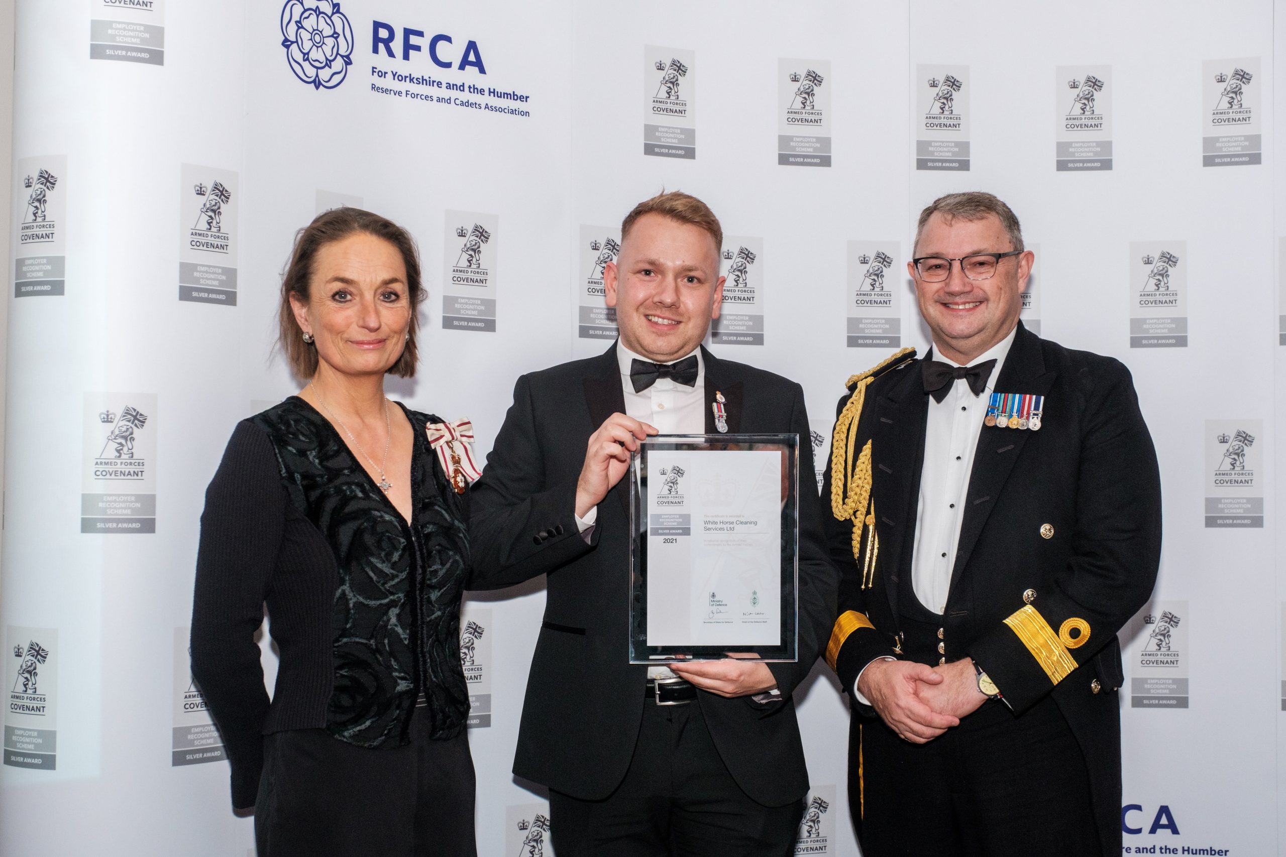 HM Lord-Lieutenant of North Yorkshire Jo Ropner with award winner from White Horse Cleaning Services Lee Harris-Hamer and Commodore Phil Waterhouse