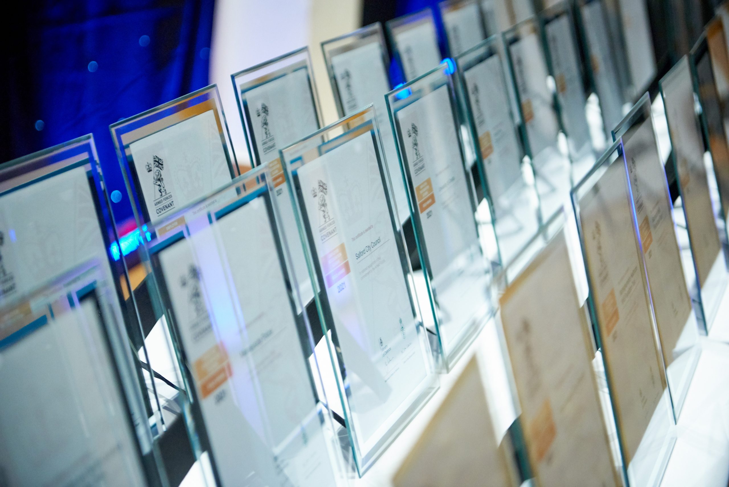 A row of framed certificates