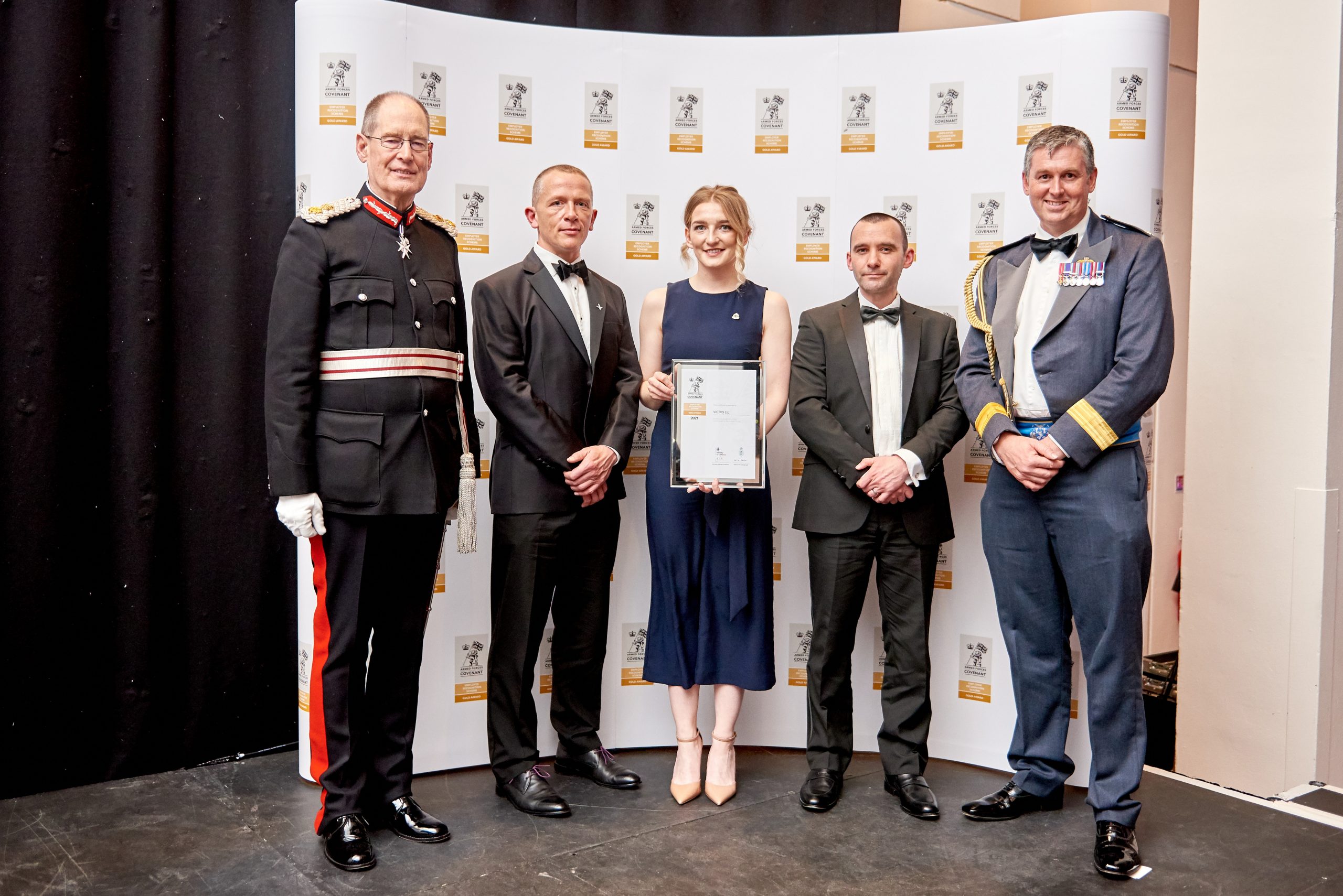 HM Lord-Lieutenant of West Yorkshire Ed Anderson with award winners from VICTVS and Air Commodore Andrew Dickens