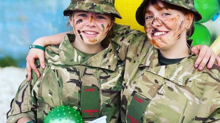 Two young cadets with camoflage on their faces