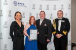 HM Lord-Lieutenant of North Yorkshire Jo Ropner with award winners from A and E Harmonious Compliance - Alison and Lee Whitworth with Commodore Phil Waterhouse