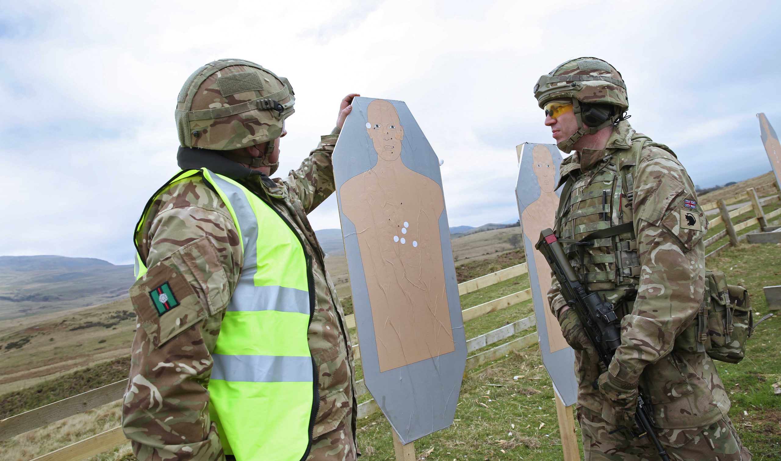 Reservist Glen Marshall and Kevin Etherington inspect target