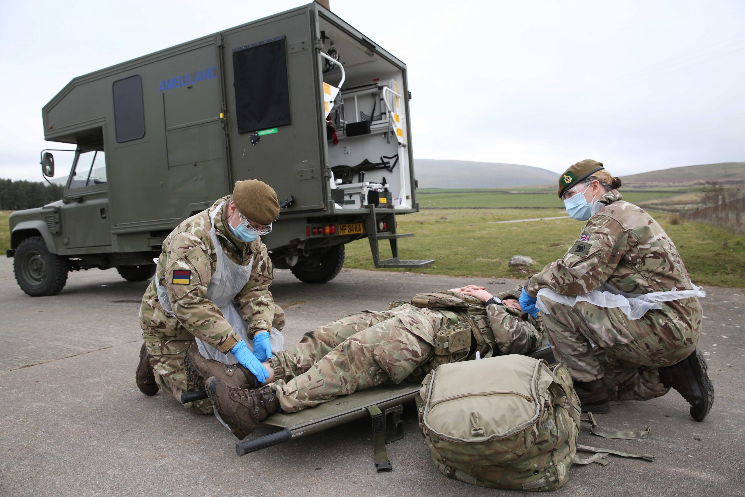 Reservists Rhoz Shutt and Kate Johnson care for a casualty