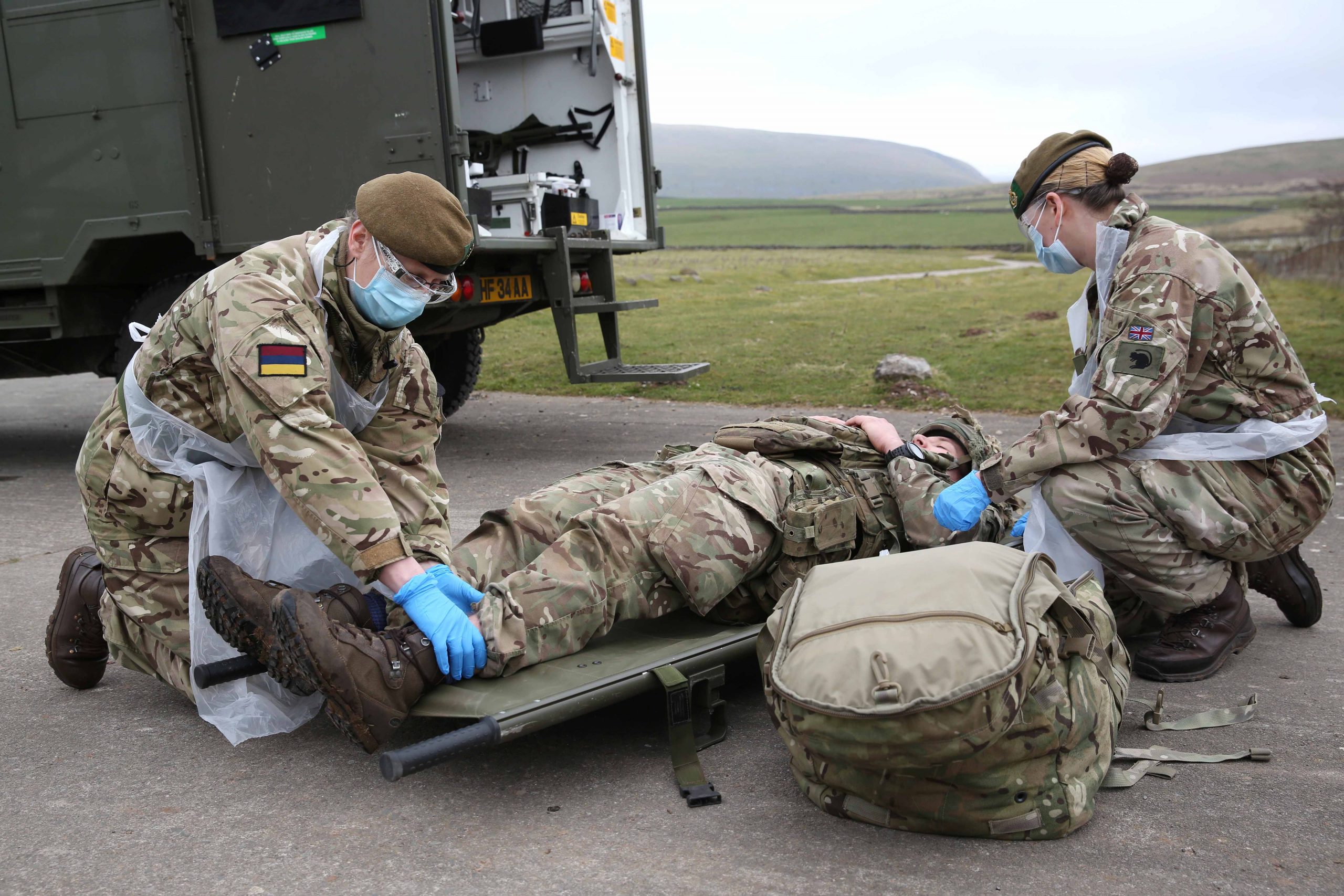 Reservists Rhoz Shutt and Kate Johnson care for a casualty