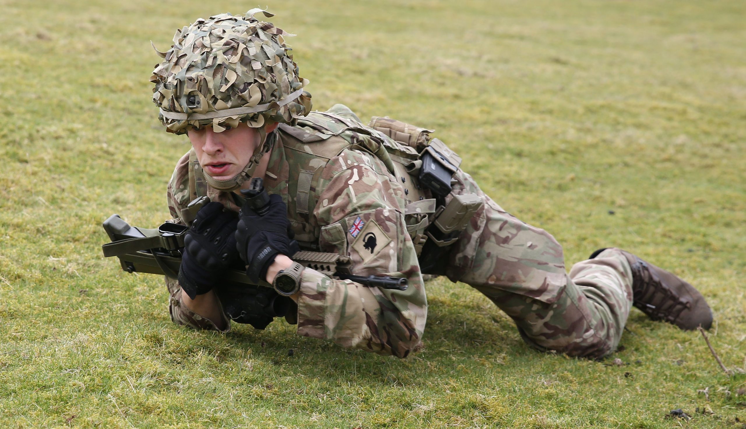 Reservist Tom Bylo practising fire and move