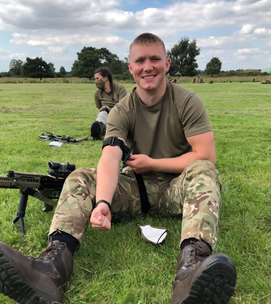 Leeds University Officer Cadet Billy Shield doing first aid training while on camp.