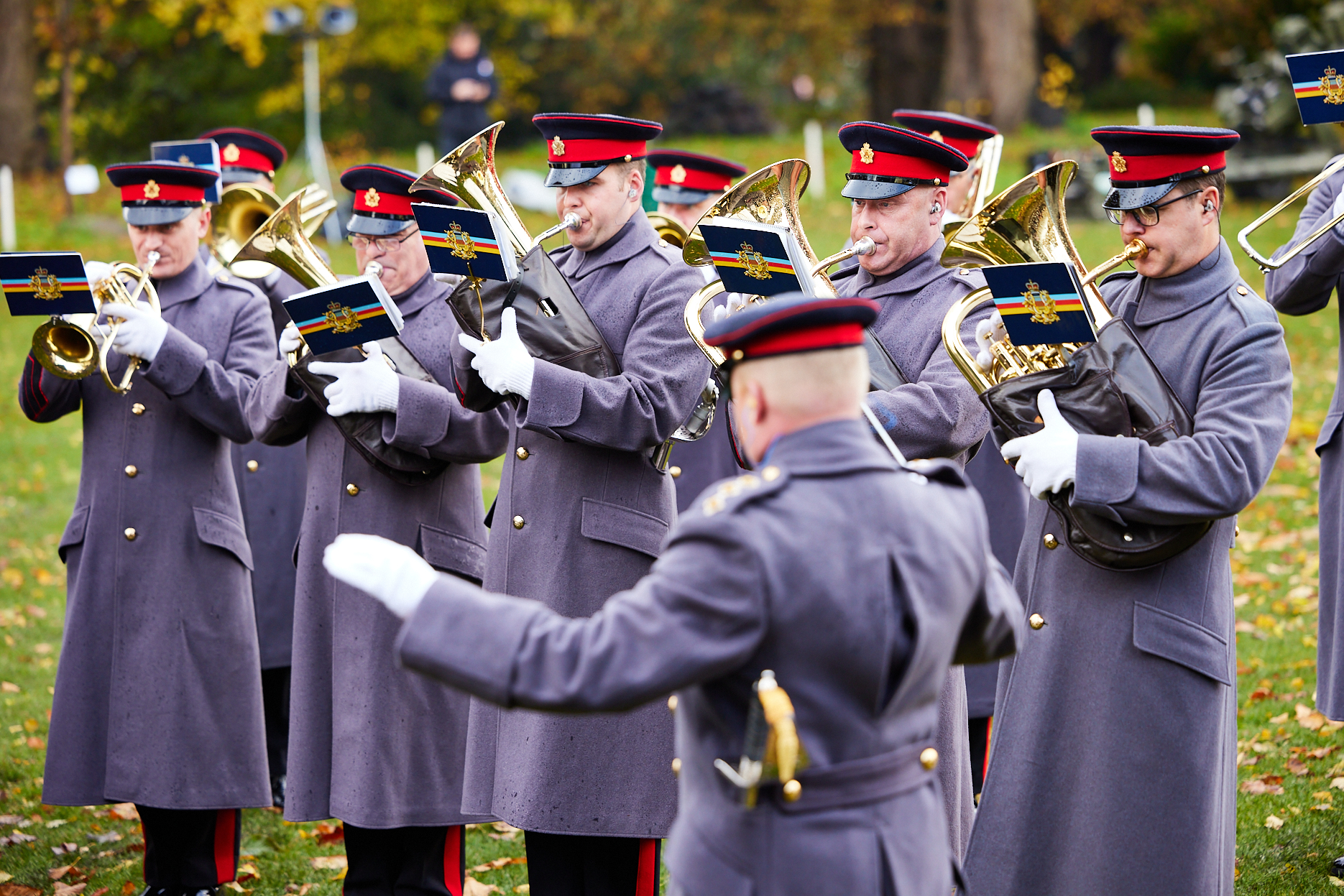 musicians in uniform playing their instruments