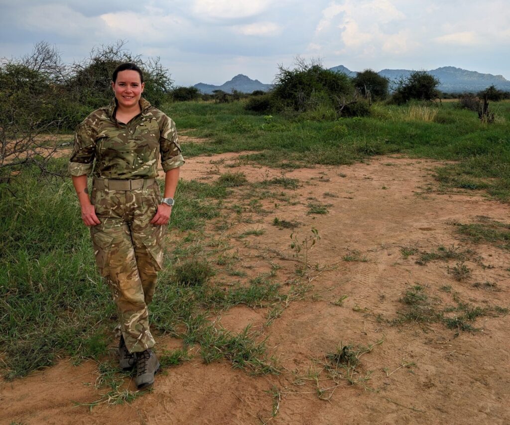 Jenny Jakeman pictured in her army uniform in a field in kenya