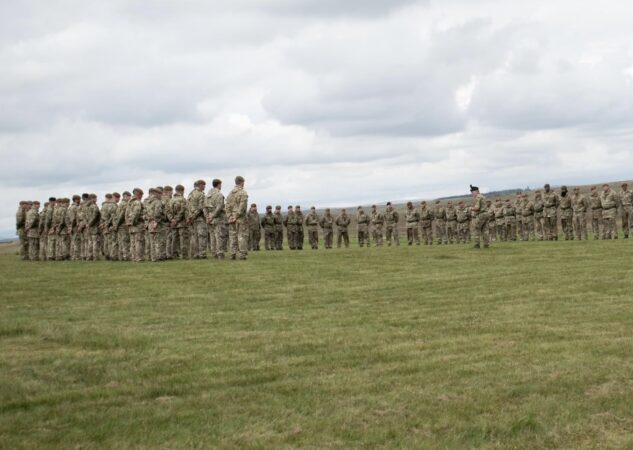 Troops on plain being given orders