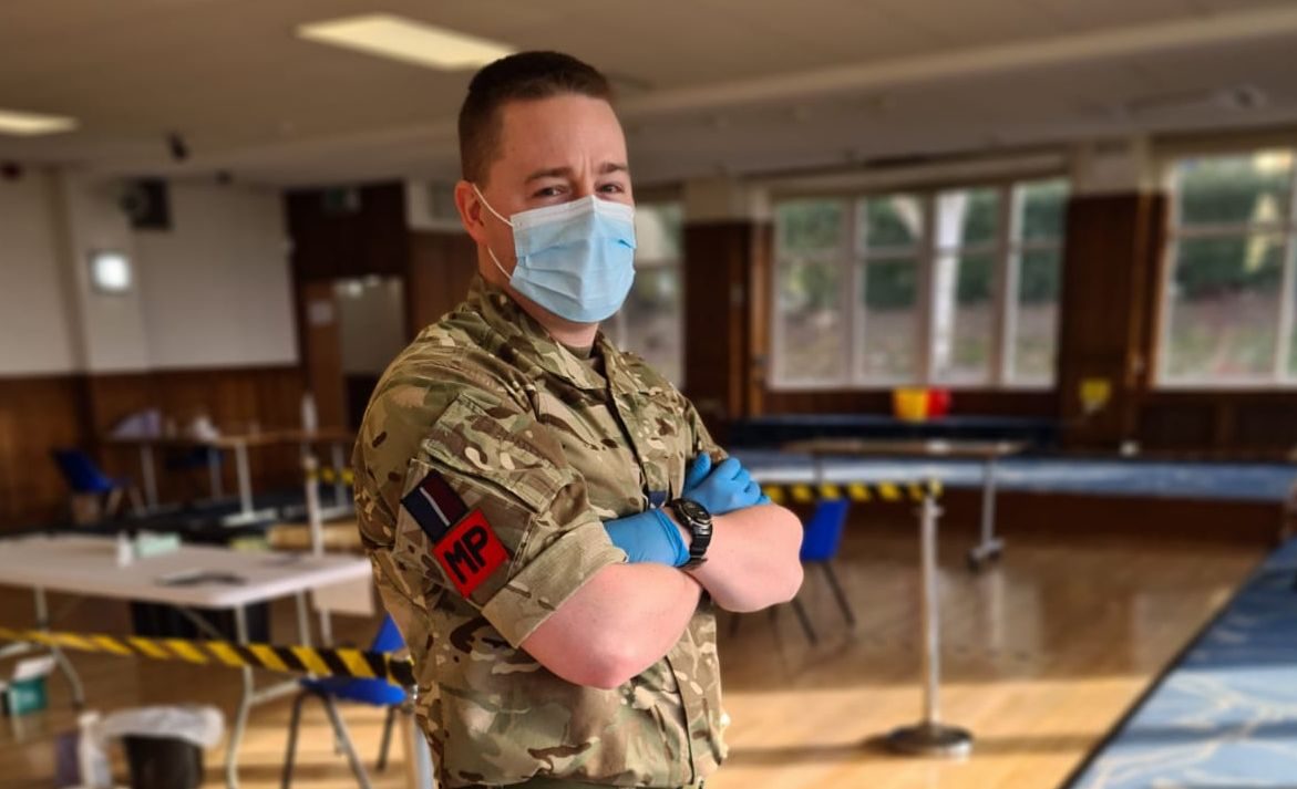 RAF reserve in face mask and rubber gloves