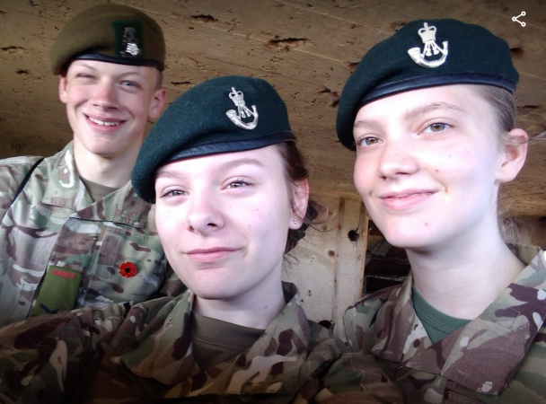 Three smiling cadets