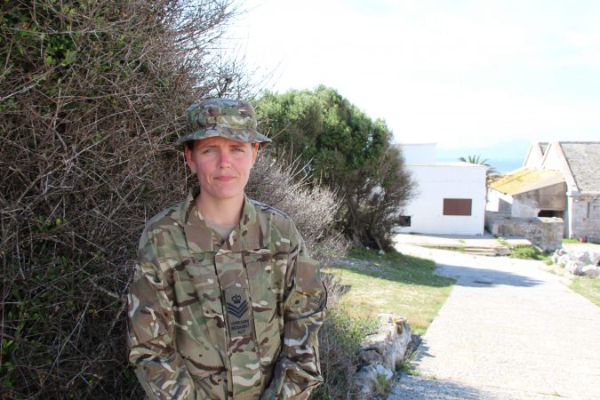 Army cadet force volunteer in combat clothing